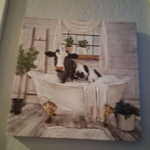 Black And White Cow in Bathtub Canvas Art